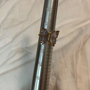 Gold tone purple butterfly ring